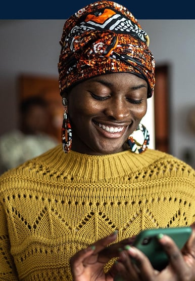 Hotels, woman smiling looking at her phone