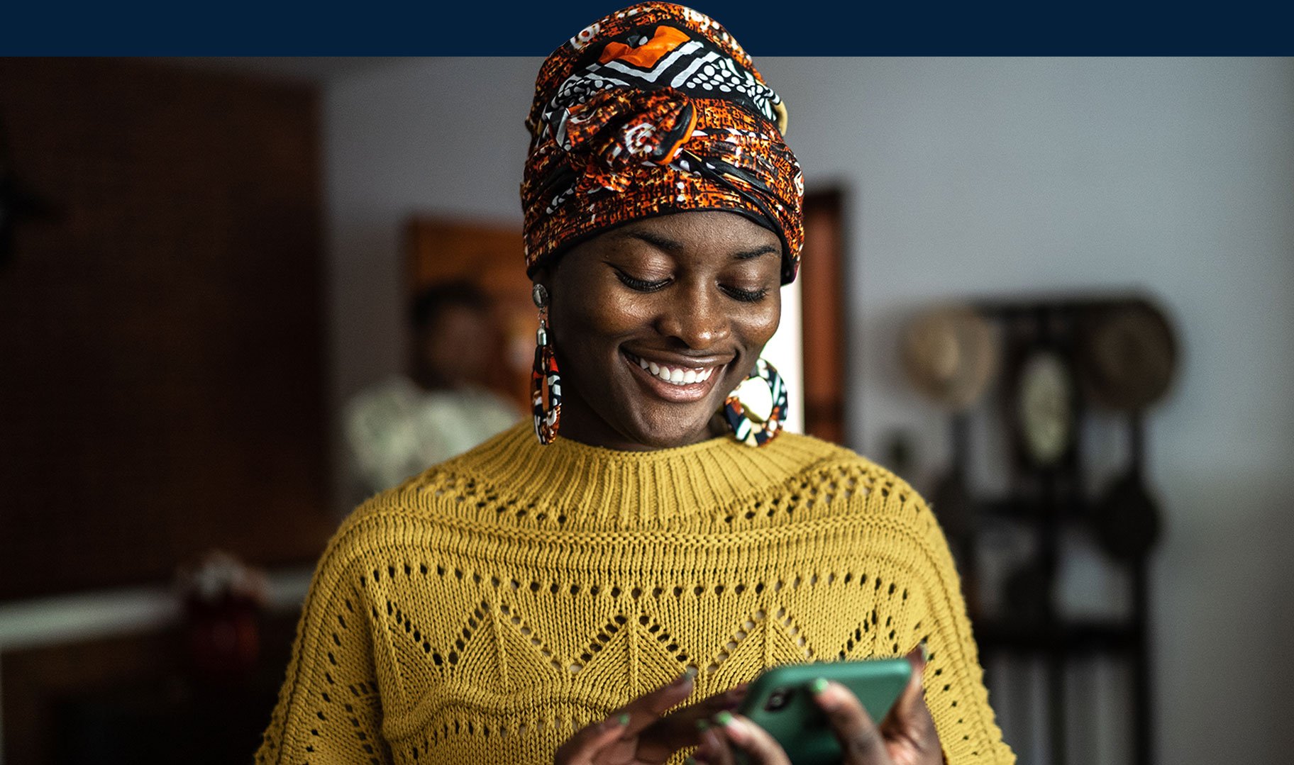 Hotels, woman smiling looking at her phone