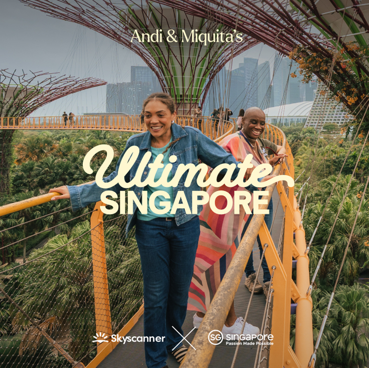 Ultimate Singapore logo placed on an image showing Andi and Miquita walking across a Sky Bridge in Singapore